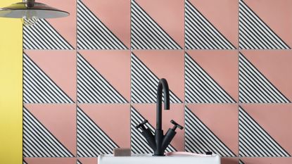 'Rah-rah' inspired modern bathroom tiles featuring cute asymmetry in eye-catching mono and pink