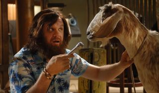 Walk Hard: The Dewey Cox Story John C. Reilly holds a mic up to a goat