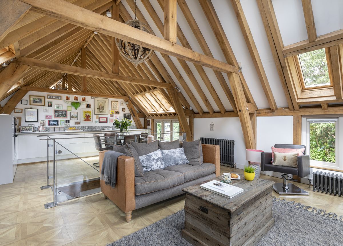 oak frame self build with timber cladding and open plan kitchen