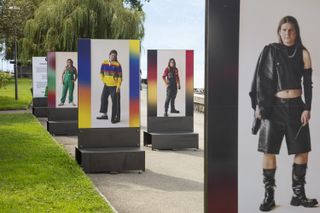 Tall photographs stand in a park