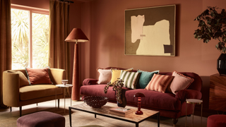 Small living room with rust and dark green furniture