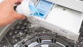 Top load washer dispenser drawer