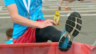 An athlete warms up his feet