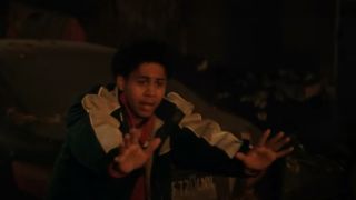 Rhenzy Feliz as Victor with his hands out in fear on The Penguin