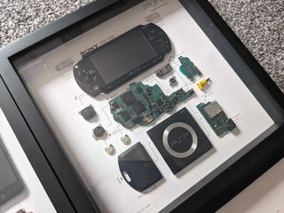 Sony PSP in a frame by Grid Studio