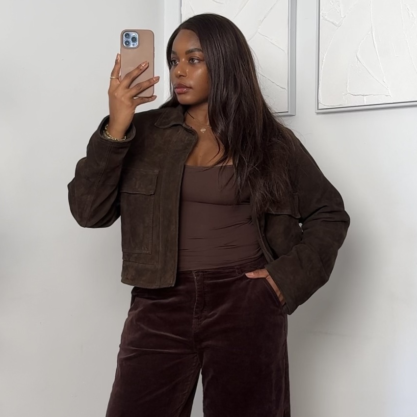 fashion and beauty influencer Kaye Bassey poses in winter 2025 2026 fashion trends suede and brown pieces