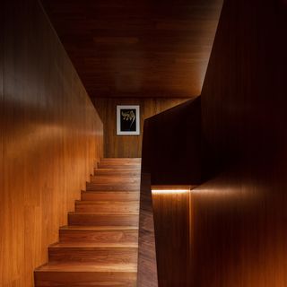 Wooden staircase in the Baraka Seaside Residence