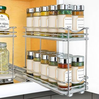 A tiered chrome spice rack organizer