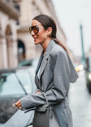 French street style - woman wearing a grey blazer