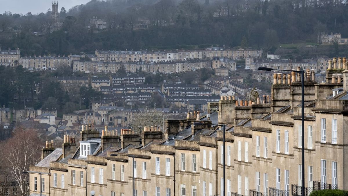 Seen from Bathwick Hill are foreground terraced homes at Dunsford Place on Bathwick Hill