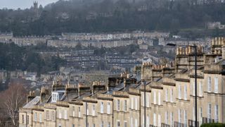 Seen from Bathwick Hill are foreground terraced homes at Dunsford Place on Bathwick Hill