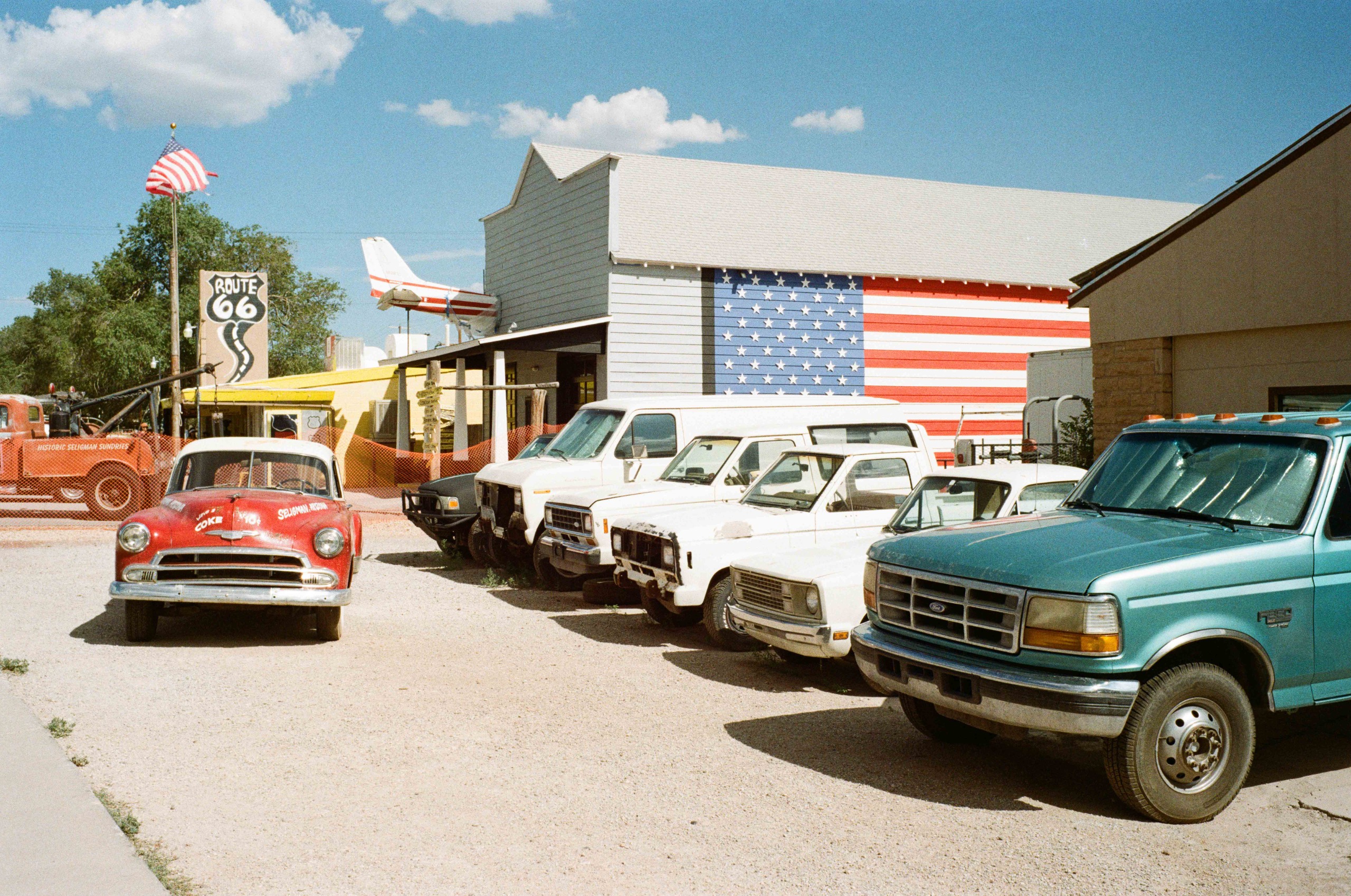 Retro-style photographs of the Route 66 road, motels and vintage vehicles