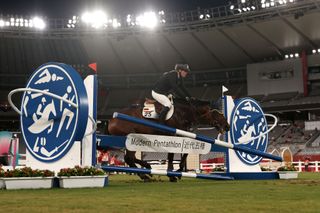 CHOFU JAPAN AUGUST 06 Annika Schleu of Team Germany fails a jump during the Riding Show Jumping of the Womens Modern Pentathlon on day fourteen of the Tokyo 2020 Olympic Games at Tokyo Stadium on August 06 2021 in Chofu Japan Photo by Dan MullanGetty Images