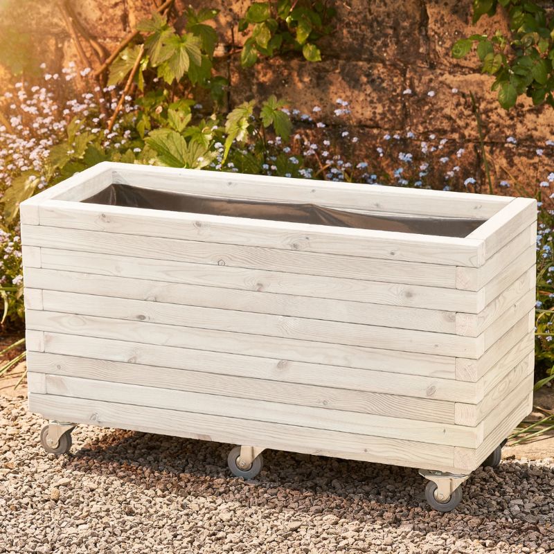 white wood wheeled planter