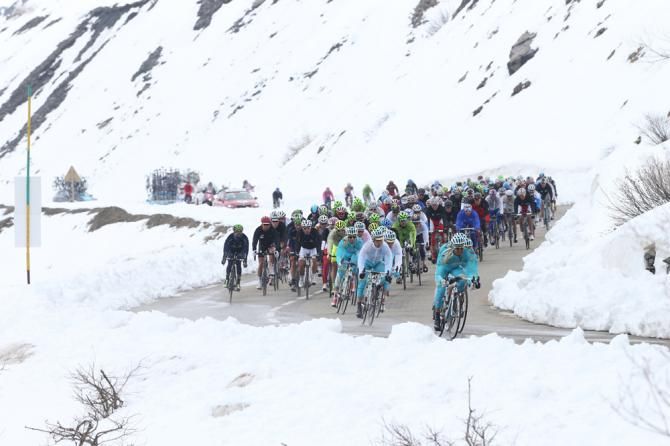Astana lead the peloton over the first climb of the day