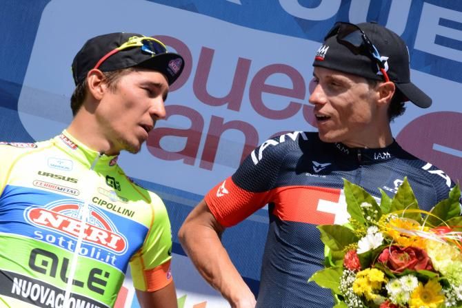 Sylvain Chavanel (IAM Cycling) has a quick chat to Andrea Fedi (Neri Sottoli-Yellow Fluo)