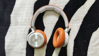 Bang & Olufsen Beoplay HX review: headphones lying on a blanket