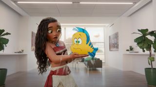 Disney character Moana holding Flounder from The Little Mermaid