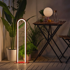 IKEA SOLVINDEN Floor Lamp on a garden patio.