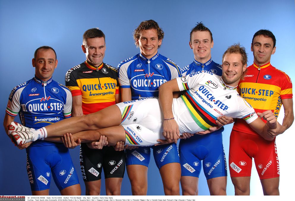 (L-R) Paolo Bettini, Nick Nuyens, Pippo Pozzato and Juan Garate hold up Tom Boonen