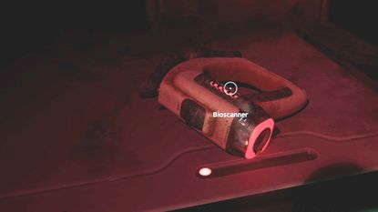 A Bioscanner lying on the ground in Subnautica 2.
