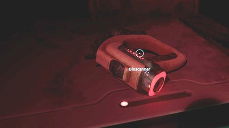 A Bioscanner lying on the ground in Subnautica 2.
