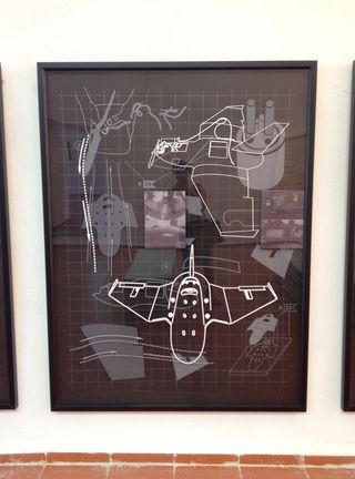 Airplane with with minutious geographical plans in a frame