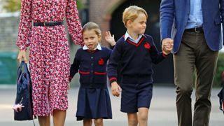 Princess Charlotte, waves as she arrives for her first day at school, with her brother Prince George and her parents the Duke and Duchess of Cambridge, at Thomas's Battersea in London on September 5, 2019 in London, England.