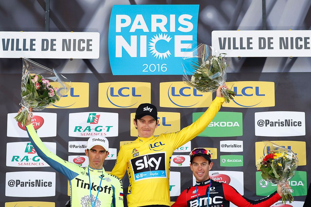 Geraint Thomas (C) celebrates on the podium with Australia's Richie Porte (R) and Spain's Alberto Contador after he won the 74th edition of the Paris-Nice