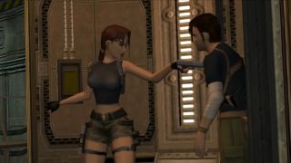 Lara Croft threatens Kurtis Trent with a pistol in Tomb Raider: The Angel of Darkness