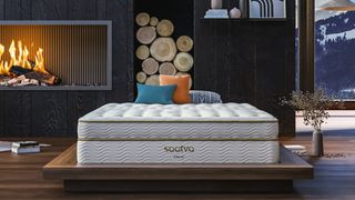 How often should you change your mattress: A Saatva Classic mattress in front of a log fire