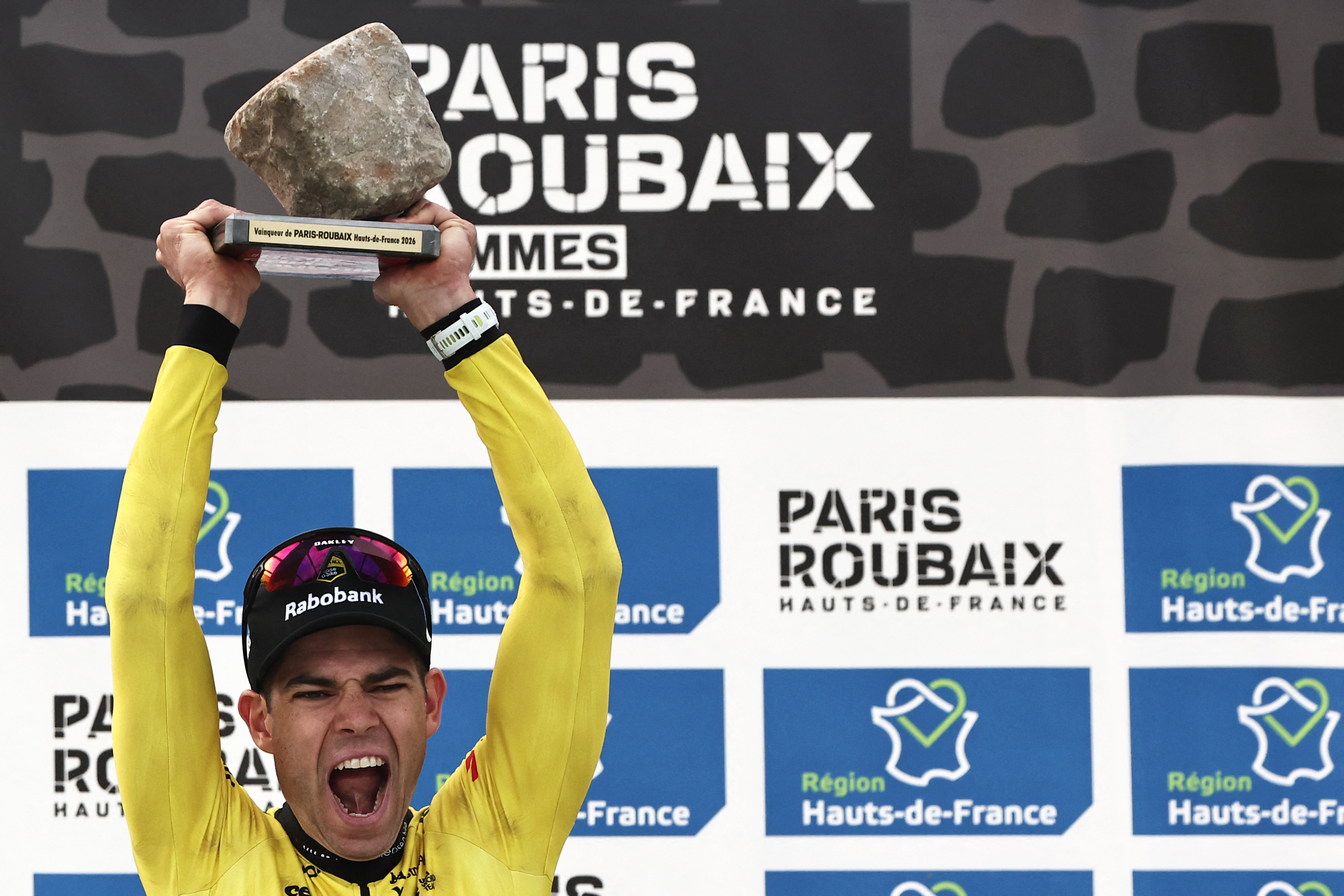 Wout van Aert celebrates on the podium of the 123rd edition of Paris-Roubaix