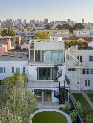 rear facade and geometric garden at Wraparound House, a San Francisco home by SAW