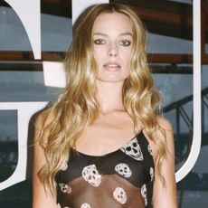 Margot Robbie wore a custom skull scarf-turned-dress from Alexander McQueen in Australia