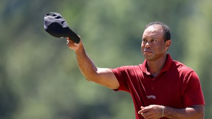 Tiger Woods tips his cap towards the patrons at the 2024 Masters