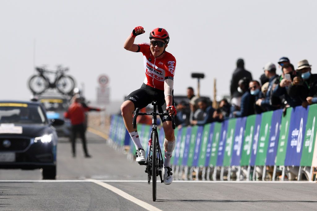 HARRAT UWAYRID SAUDI ARABIA FEBRUARY 04 Maxim Van Gils of Belgium and Team Lotto Soudal celebrates winning during the 6th Saudi Tour 2022 Stage 4 a 1493km stage from Winter Park to Skyviews of Harrat Uwayrid 1159m SaudiTour on February 04 2022 in Harrat Uwayrid Saudi Arabia Photo by Tim de WaeleGetty Images