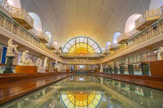 The Piscine museum in Roubaix just outside Lille, with stained glass window and 1920s pool