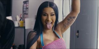 Hustlers Cardi B sticks her tongue out playfully