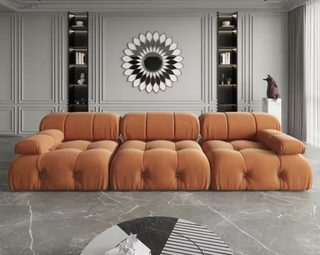 Contemporary velvet sofa in orange from Home Depot. 