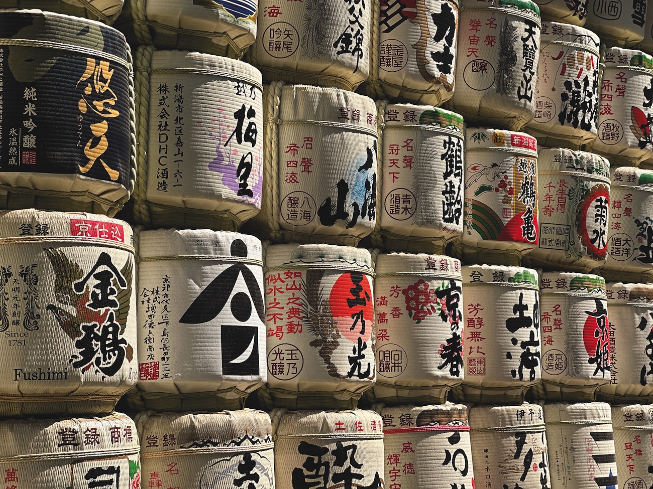 a wall of sake barrels