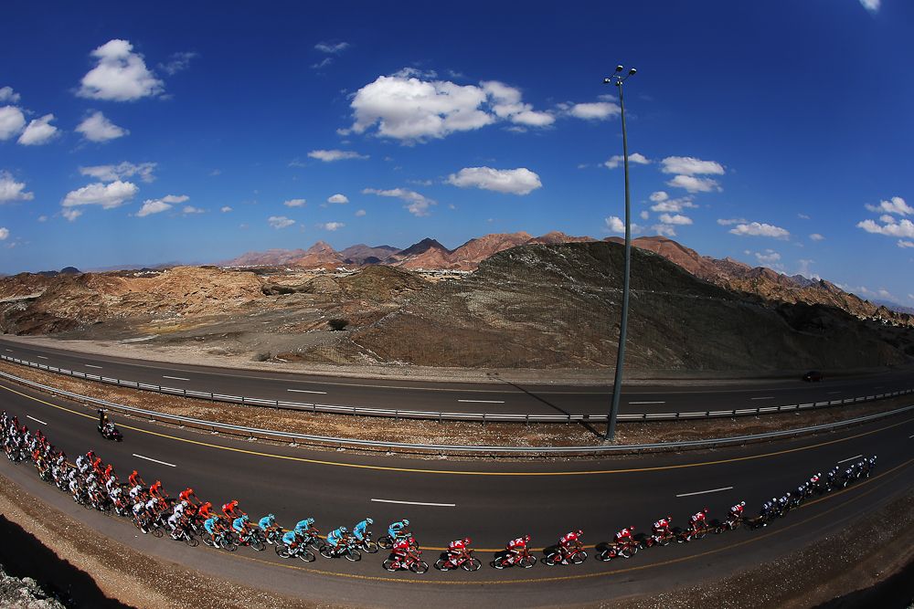 The peloton rides through the Oman countryside during stage two of the 2016 Tour of Oman