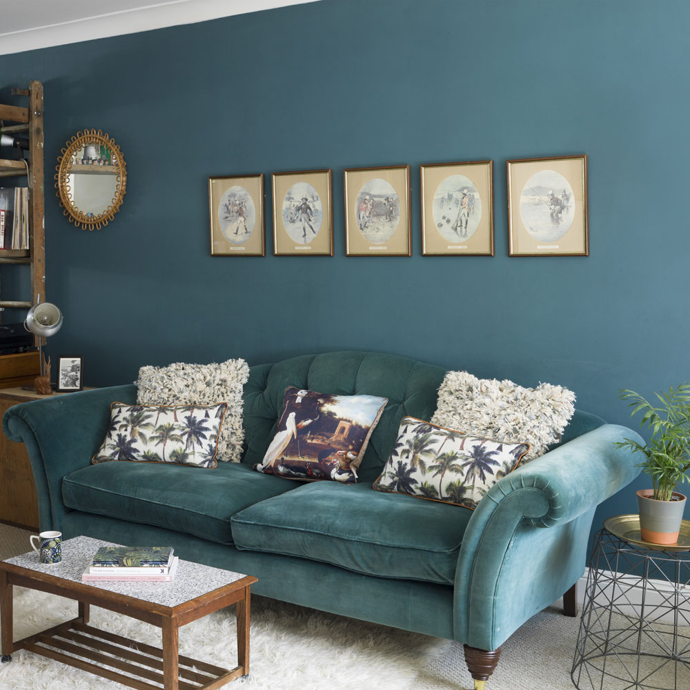 Teal living room with a teal velvet sofa