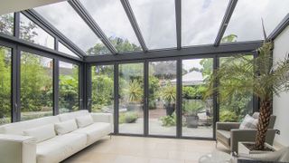 contemporary conservatory with grey window frames