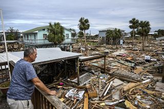 David Hester surveys the damage to his house on Sept. 28, the day after Hurricane Helene made landfall in Florida.