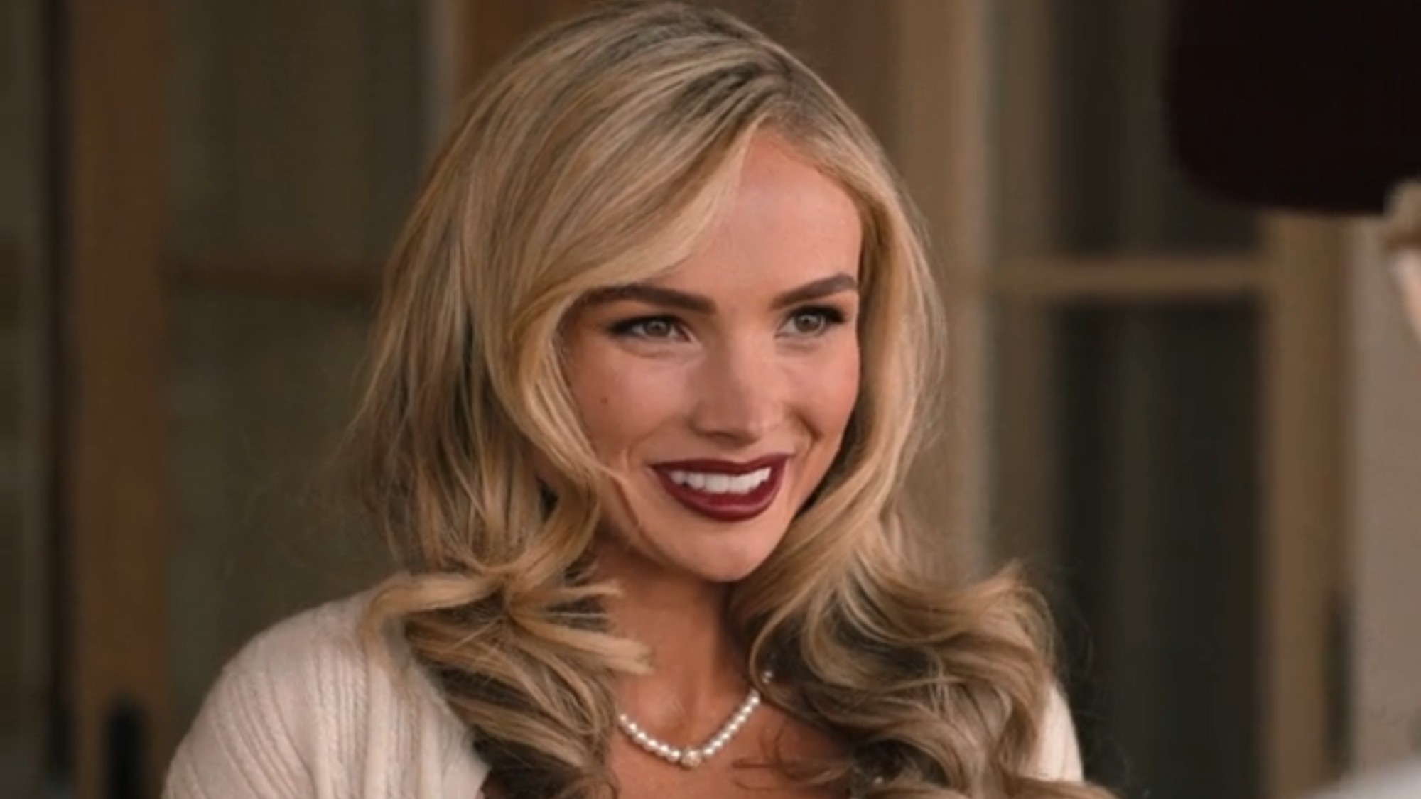 Natalie Alyn Lind as Oreana smiling in Dutton Ranch. 
