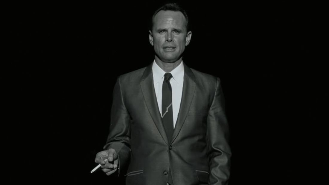 Cooper Howard (Walton Goggins) seen in black and white during an advert sequence in Fallout episode 6. 