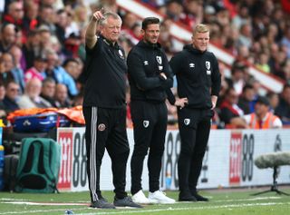 Sheffield United manager Chris Wilder, left, and Bournemouth boss Eddie Howe, right, watch on