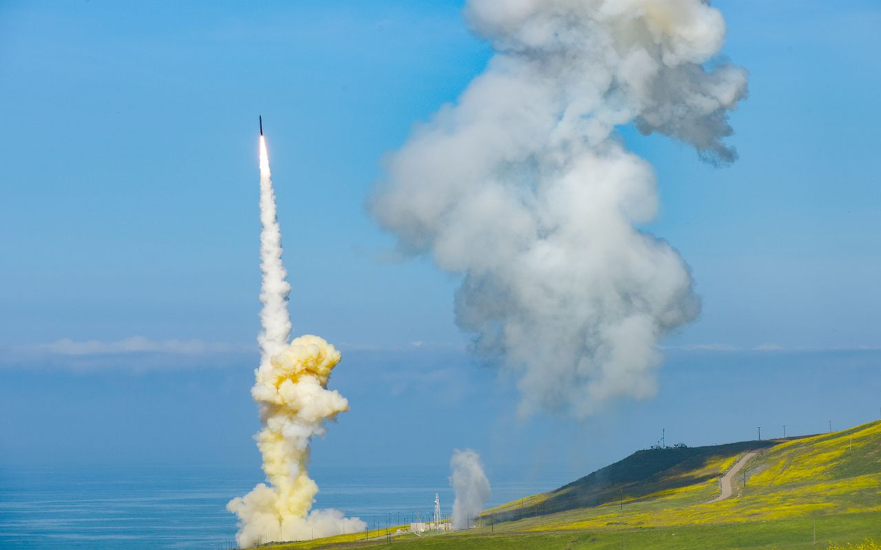 The 'trail' Ground-based Interceptor is launched from Vandenberg Air Force Base, Calif., March 25, 2019. The remnants of a plume from a second launch in the salvo can be seen at right.