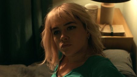 Almut lying in bed talking to Tobias in We Live In Time