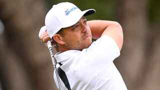 Xander Schauffele takes a tee shot at The American Express